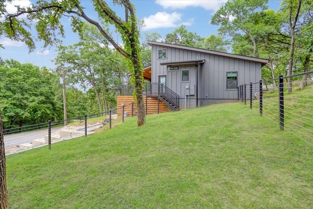 142 Wales Dr, Pottsboro, TX 75076 - view of front facade featuring board and batten siding and stairway
