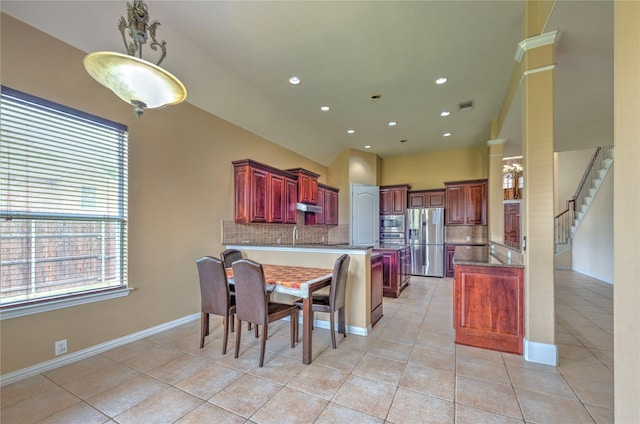 319 Paloverde Ln, Frisco, TX 75036 - dining area featuring healthy amount of natural light, light tile patterned floors, recessed lighting, and baseboards