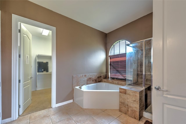 319 Paloverde Ln, Frisco, TX 75036 - full bathroom with tile patterned flooring, a shower stall, and a garden tub