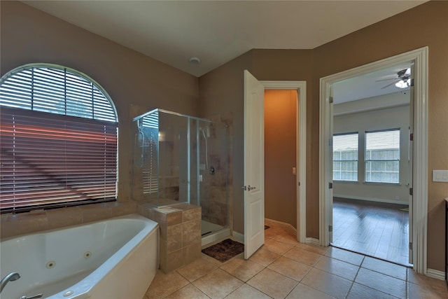 319 Paloverde Ln, Frisco, TX 75036 - bathroom with a shower stall, a tub with jets, tile patterned flooring, and baseboards