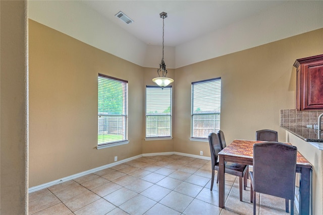 319 Paloverde Ln, Frisco, TX 75036 - dining room featuring light tile patterned floors and baseboards