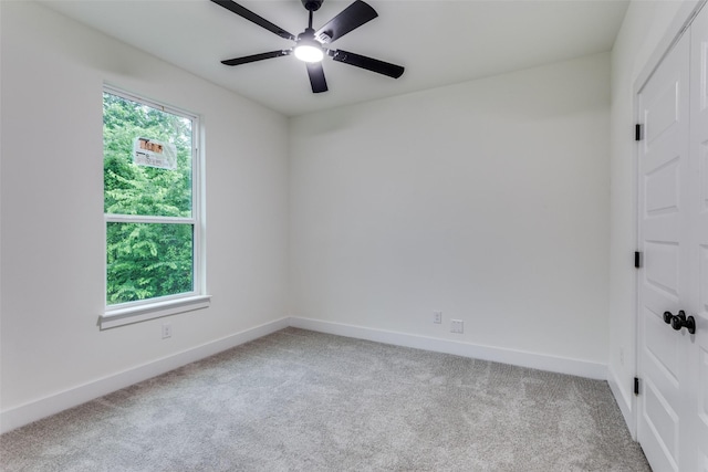 2614 Ave G, Fort Worth, TX 76105 - spare room with carpet, a ceiling fan, and baseboards