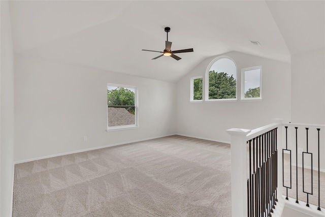 1529 Harvest Run Dr, Allen, TX 75002 - carpeted empty room with a ceiling fan, vaulted ceiling, and baseboards