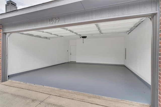 1529 Harvest Run Dr, Allen, TX 75002 - garage with baseboards and a garage door opener