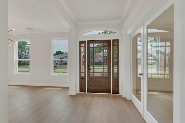 1529 Harvest Run Dr, Allen, TX 75002 - entryway featuring wood finished floors, ornamental molding, and baseboards