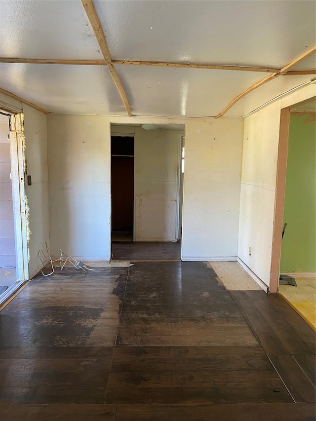 303 Pecan St, Bardwell, TX 75101 - spare room featuring hardwood / wood-style flooring