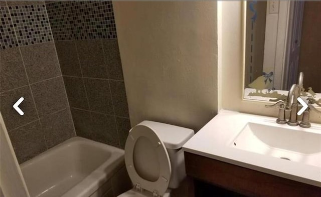 982 S Weatherred Dr Unit B, Richardson, TX 75080 - full bathroom with vanity, toilet, and shower / bathtub combination