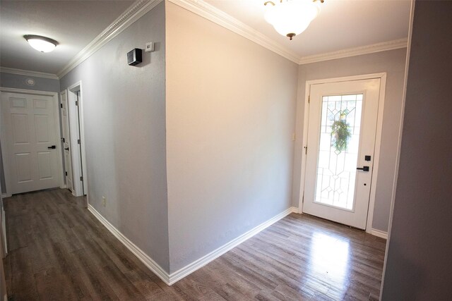 1413 Oak Hills Dr, Graham, TX 76450 - foyer featuring dark wood finished floors, crown molding, and baseboards