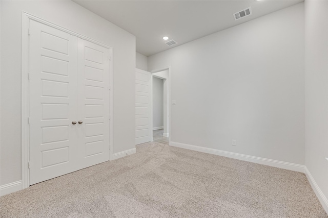 7111 Manhattan Dr, Rowlett, TX 75088 - unfurnished bedroom featuring carpet flooring, baseboards, a closet, and recessed lighting