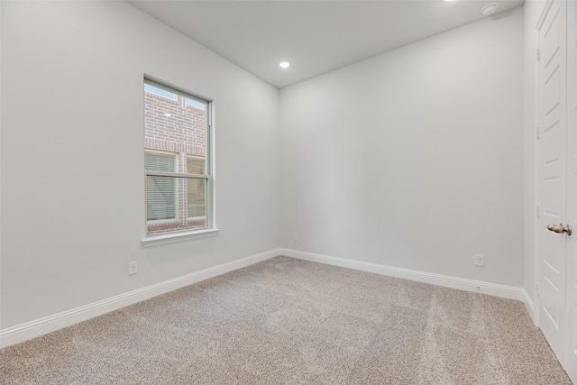 7111 Manhattan Dr, Rowlett, TX 75088 - spare room featuring carpet floors, baseboards, recessed lighting, and a smoke detector