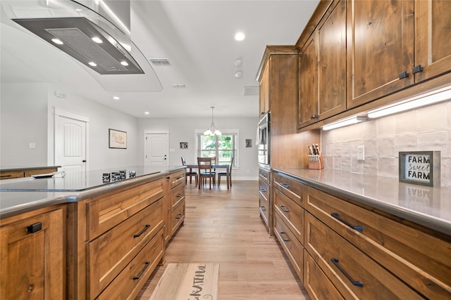 12570 County Road 313, Tyler, TX 75708 - kitchen featuring black electric stovetop, recessed lighting, light wood finished floors, exhaust hood, and backsplash