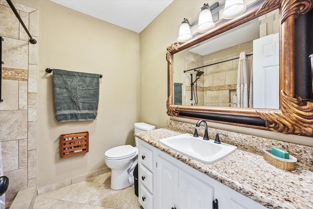 635 Old Justin Rd, Argyle, TX 76226 - full bath with a tile shower, tile patterned flooring, toilet, vanity, and baseboards