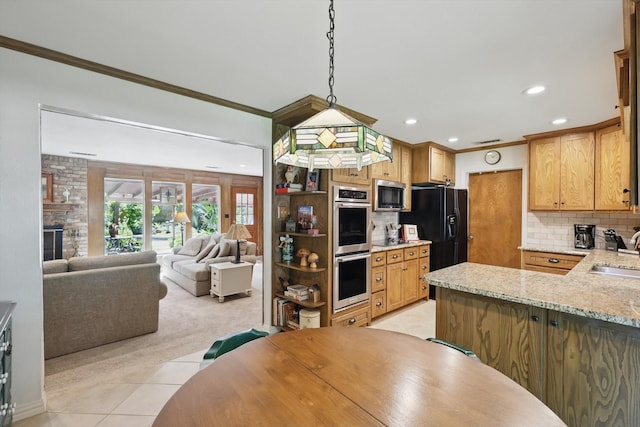 4401 Longacres Ct, Arlington, TX 76016 - kitchen featuring black appliances, a sink, recessed lighting, crown molding, and backsplash