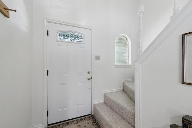 4401 Longacres Ct, Arlington, TX 76016 - foyer with healthy amount of natural light, stairs, carpet flooring, and baseboards