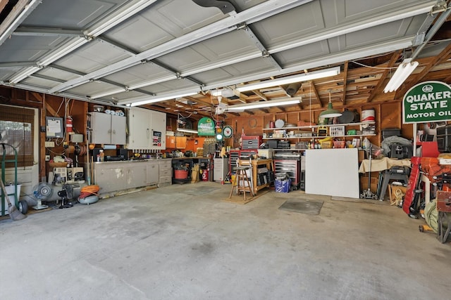 4401 Longacres Ct, Arlington, TX 76016 - garage featuring a workshop area