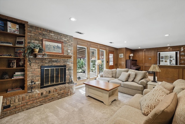 4401 Longacres Ct, Arlington, TX 76016 - living area with light carpet, a brick fireplace, recessed lighting, and wooden walls