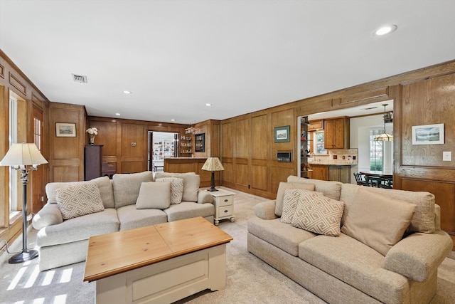4401 Longacres Ct, Arlington, TX 76016 - living room featuring wooden walls, light carpet, and recessed lighting