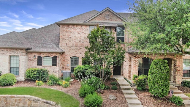 5719 Butterfly Way, Fairview, TX 75069 - view of front of house with brick siding and roof with shingles