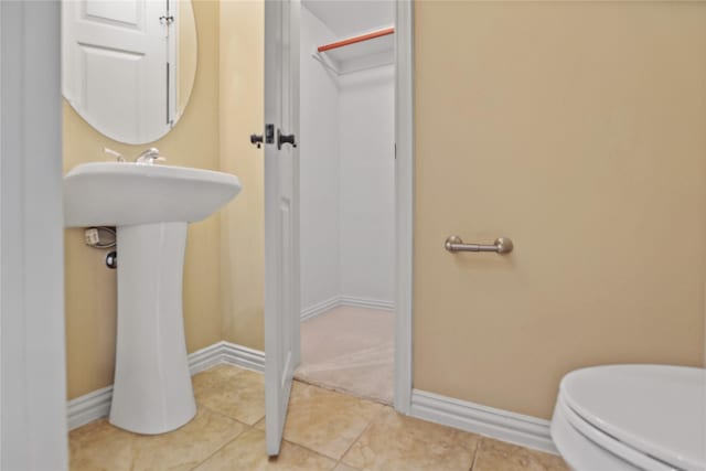 5719 Butterfly Way, Fairview, TX 75069 - bathroom featuring baseboards and tile patterned flooring