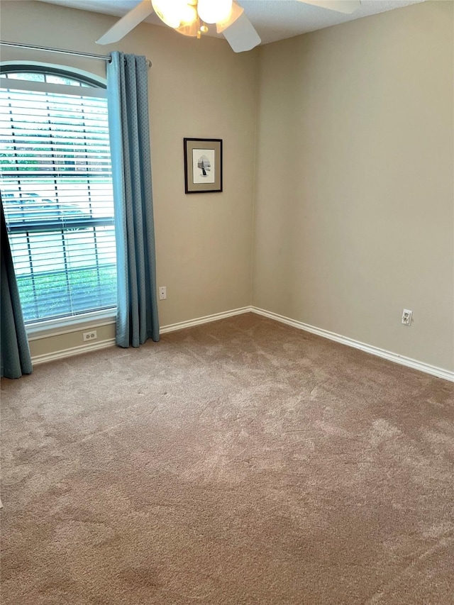 1405 Heritage Hill Dr, Desoto, TX 75115 - carpeted spare room with plenty of natural light, a ceiling fan, and baseboards