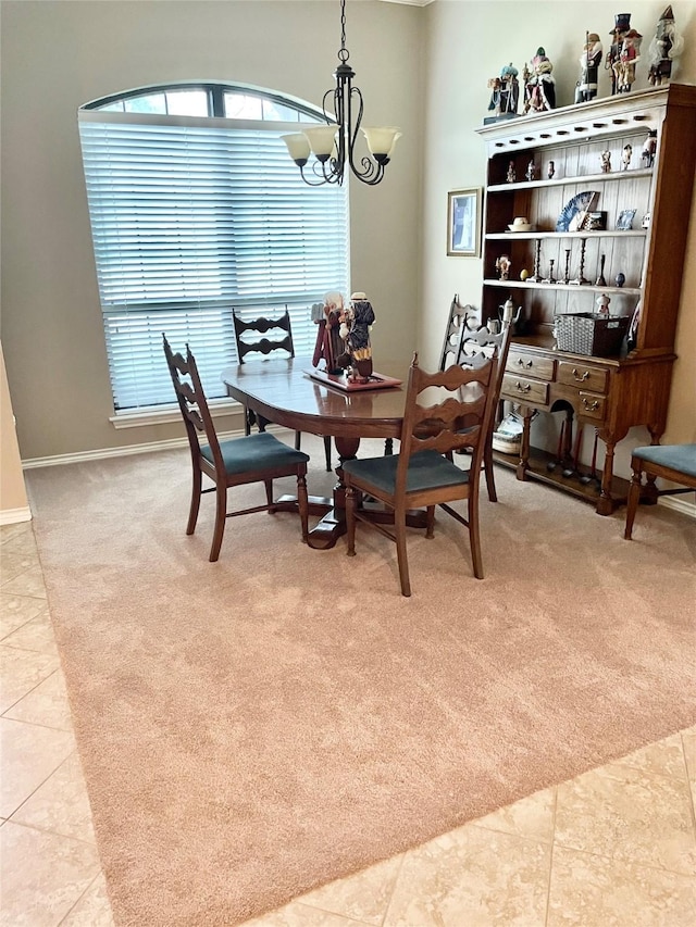 1405 Heritage Hill Dr, Desoto, TX 75115 - dining space with a chandelier, light carpet, light tile patterned floors, and baseboards