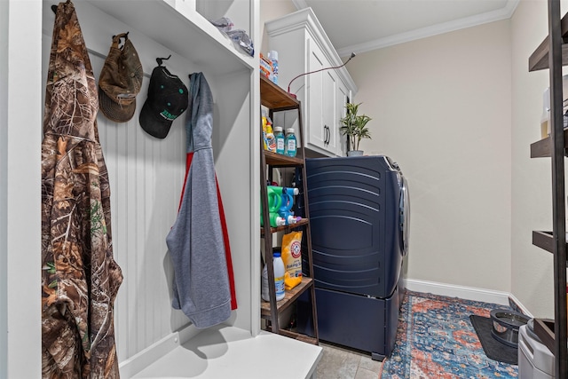 101 Cedar Mountain Dr, Weatherford, TX 76085 - laundry room with cabinet space, ornamental molding, and baseboards