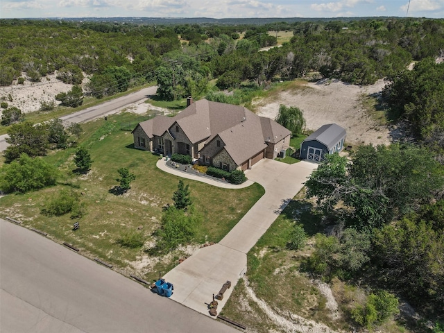 101 Cedar Mountain Dr, Weatherford, TX 76085 - aerial view of property and surrounding area with a heavily wooded area