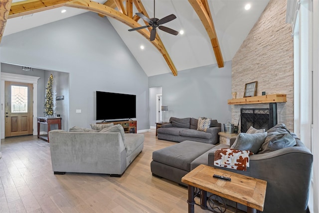101 Cedar Mountain Dr, Weatherford, TX 76085 - living area featuring high vaulted ceiling, ceiling fan, beam ceiling, light wood-type flooring, and a fireplace