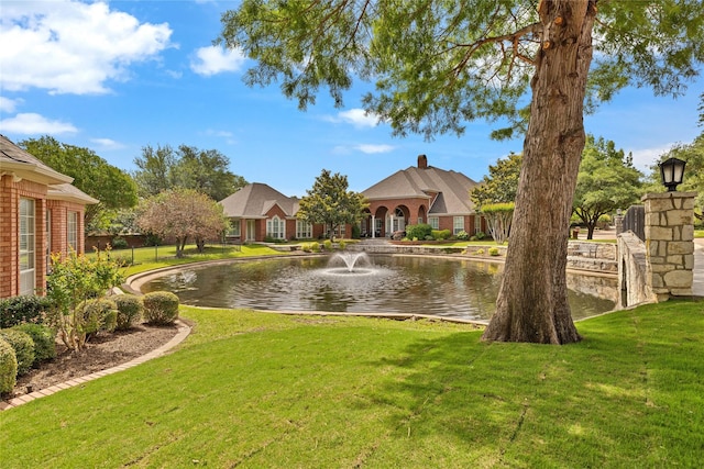 5503 Arch Bridge Ct, Arlington, TX 76017 - view of green lawn featuring a water view