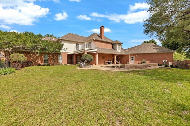 5503 Arch Bridge Ct, Arlington, TX 76017 - rear view of property with a balcony, a patio area, a chimney, and brick siding