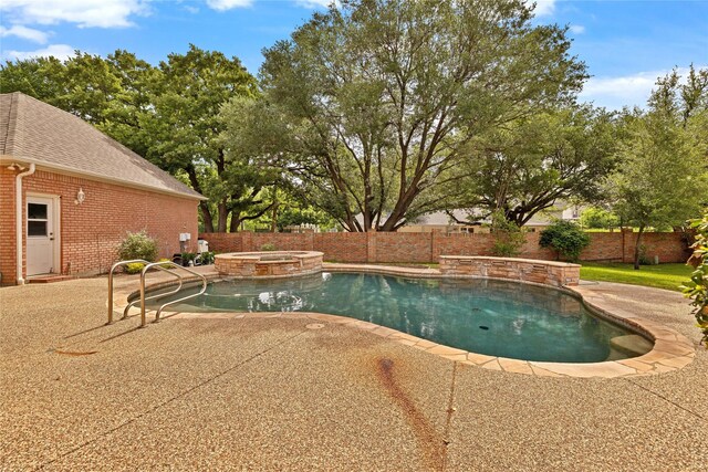 5503 Arch Bridge Ct, Arlington, TX 76017 - view of swimming pool featuring a fenced backyard, a patio area, and a pool with connected hot tub
