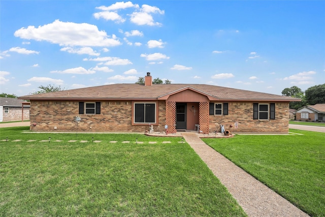 601 Circle Creek Dr, Hewitt, TX 76643 - view of front of home with brick siding, a front lawn, and a chimney
