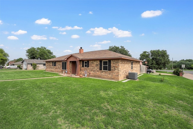 601 Circle Creek Dr, Hewitt, TX 76643 - single story home with a front yard, a chimney, brick siding, and cooling unit