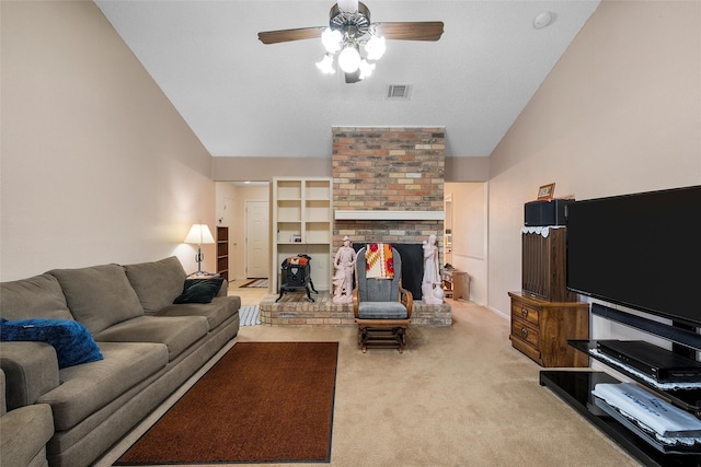 601 Circle Creek Dr, Hewitt, TX 76643 - carpeted living room with vaulted ceiling, ceiling fan, and a fireplace