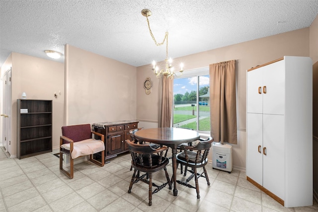601 Circle Creek Dr, Hewitt, TX 76643 - dining room with a textured ceiling and a chandelier