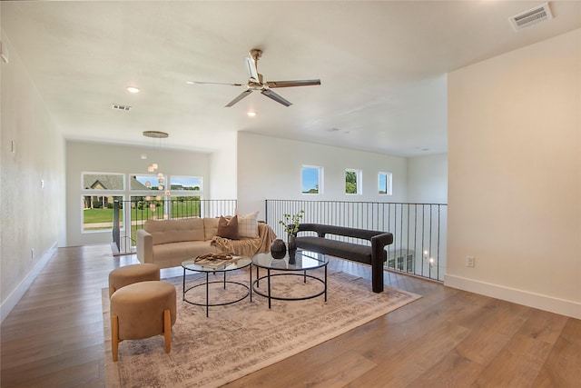10356 Wild Rose Cir, Forney, TX 75126 - living room featuring ceiling fan, wood finished floors, baseboards, and recessed lighting