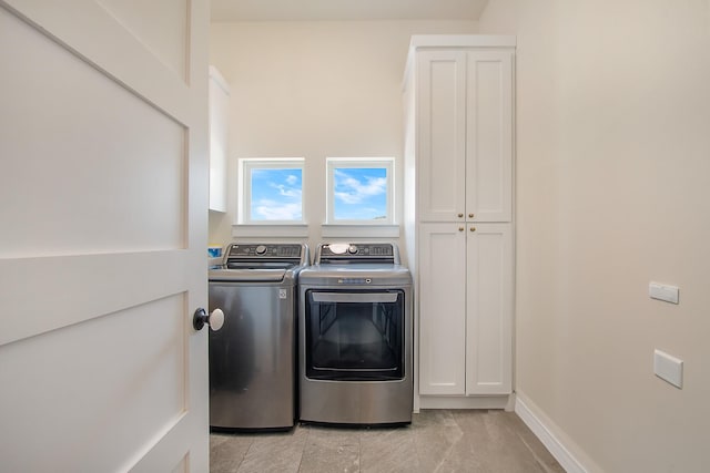 10356 Wild Rose Cir, Forney, TX 75126 - washroom with washing machine and dryer and cabinet space