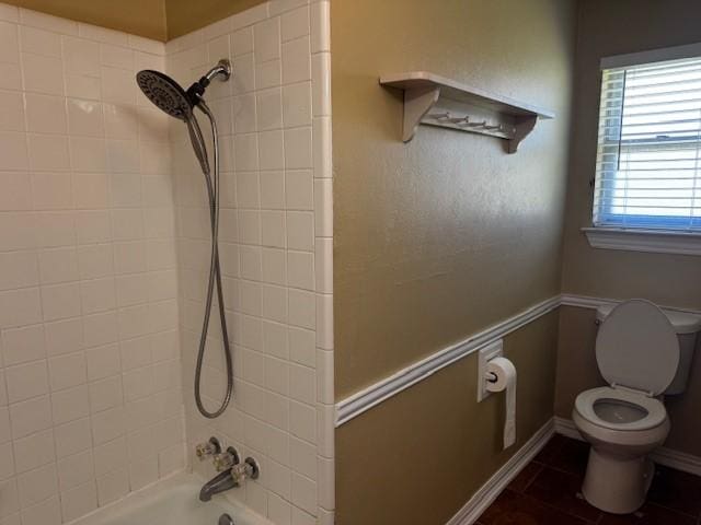 7625 Deaver Dr, North Richland Hills, TX 76180 - full bathroom featuring toilet, shower / tub combination, and tile patterned floors