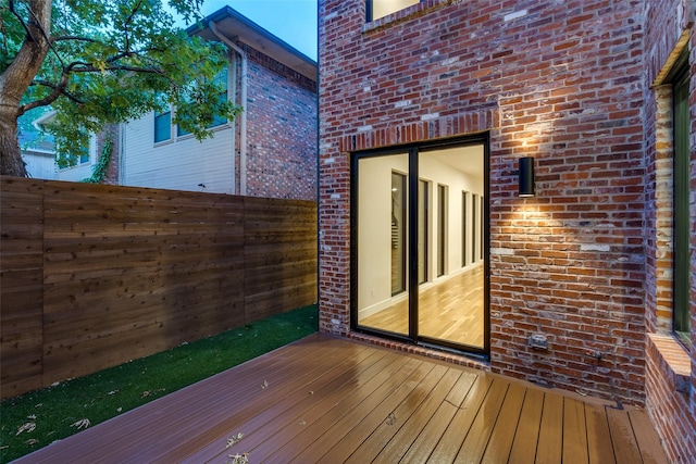 wooden deck featuring fence