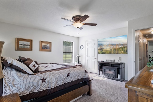 233 Reast Rd, Whitesboro, TX 76273 - carpeted bedroom featuring a ceiling fan