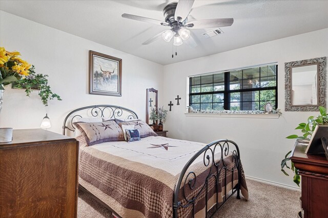 233 Reast Rd, Whitesboro, TX 76273 - bedroom with carpet flooring, baseboards, and ceiling fan