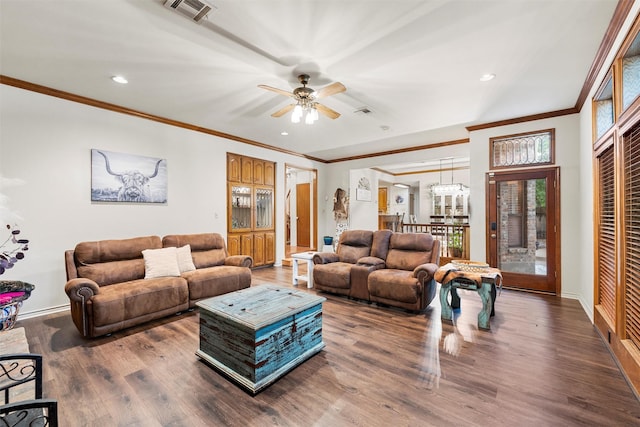 444 Lost Forest Ln, Marlin, TX 76661 - living area with wood finished floors, crown molding, ceiling fan, recessed lighting, and baseboards