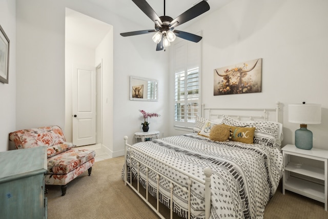 4108 Fall Aster Way, Aubrey, TX 76227 - bedroom with light colored carpet, ceiling fan, and a high ceiling