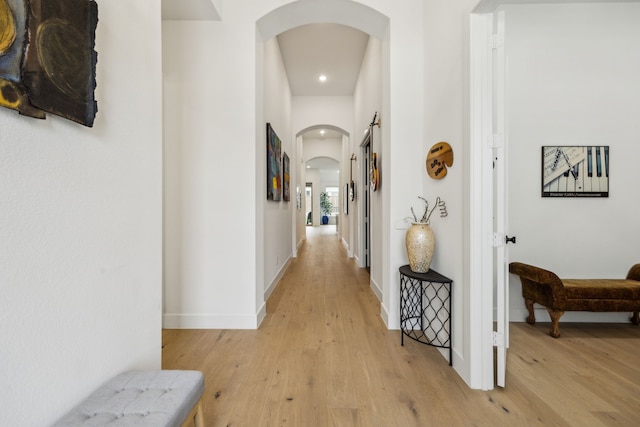 4108 Fall Aster Way, Aubrey, TX 76227 - corridor featuring arched walkways, light wood finished floors, recessed lighting, and baseboards