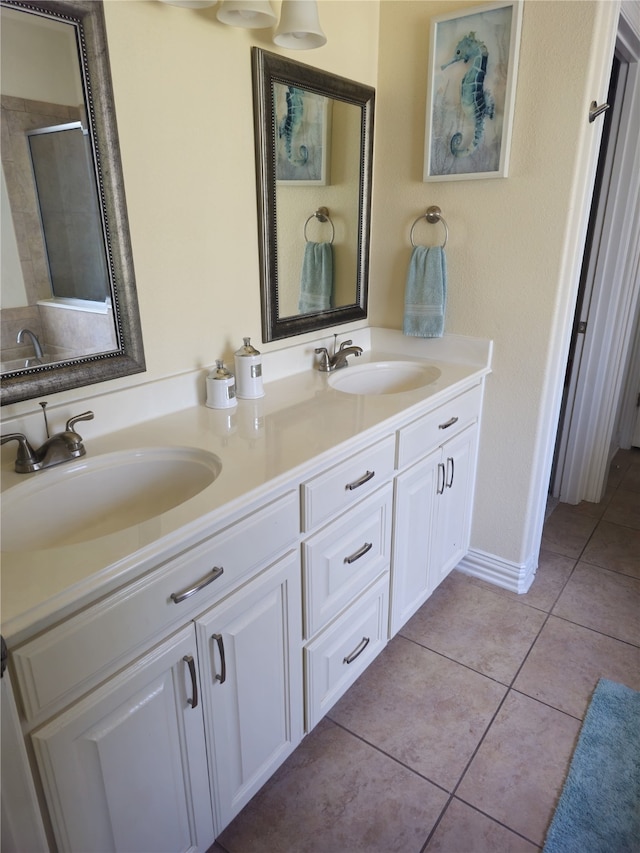 16 Cedar Bayou Cir, Pottsboro, TX 75076 - bathroom with a stall shower, double vanity, and tile patterned floors