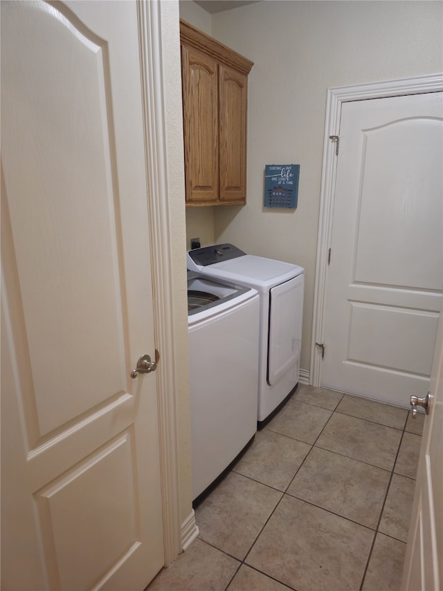 16 Cedar Bayou Cir, Pottsboro, TX 75076 - clothes washing area featuring cabinet space, washing machine and clothes dryer, and light tile patterned flooring