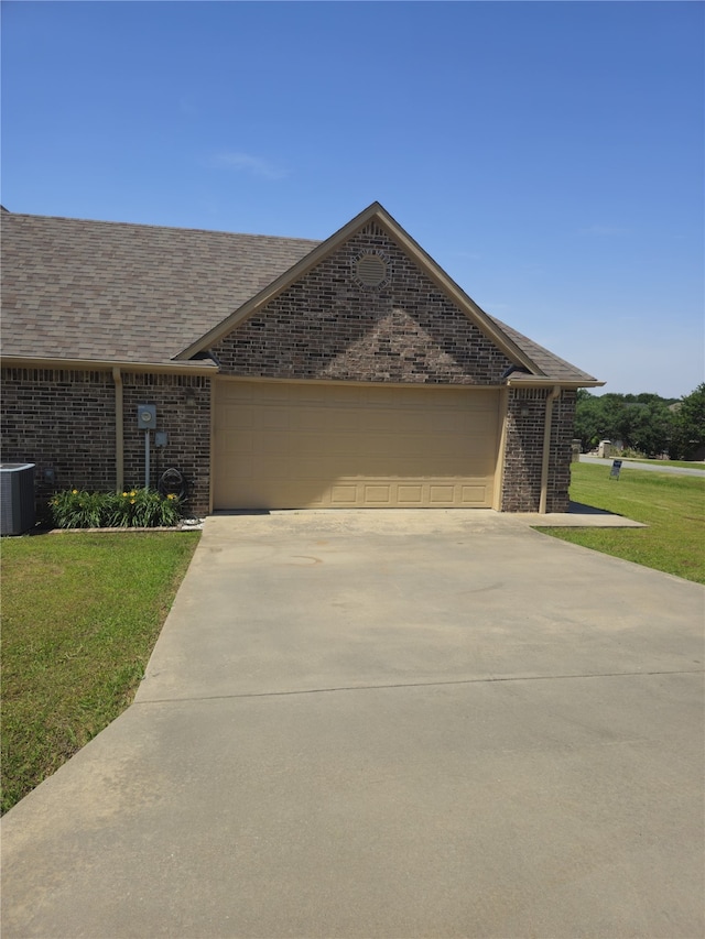 16 Cedar Bayou Cir, Pottsboro, TX 75076 - view of front of property with brick siding, an attached garage, concrete driveway, and a front lawn