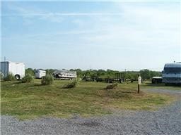 16 Cedar Bayou Cir, Pottsboro, TX 75076 - view of yard featuring gravel driveway