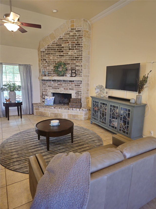 16 Cedar Bayou Cir, Pottsboro, TX 75076 - tiled living area featuring a fireplace, ceiling fan, vaulted ceiling, and ornamental molding