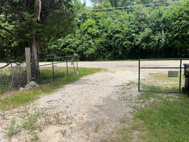 3052 Vz County Road 3810, Wills Point, TX 75169 - view of road featuring a gate and a gated entry